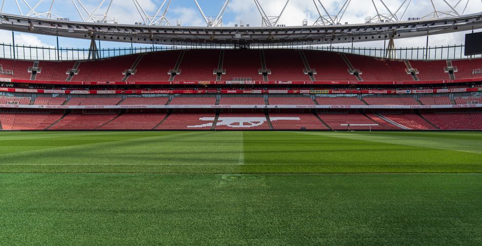 Wide view of an empty Emirates Stadium, home of Arsenal FC, in North London, England.